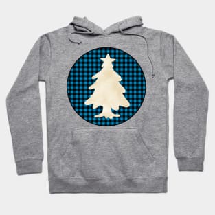 Christmas tree silhouette over a black and blue tile pattern Hoodie